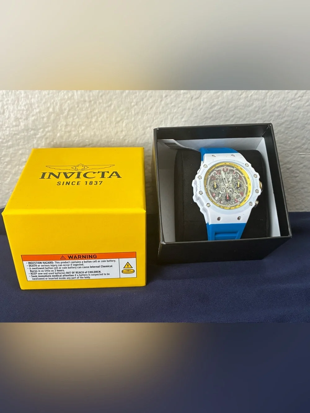 Invicta White Case Watch with Bright Blue Strap and Yellow Crown